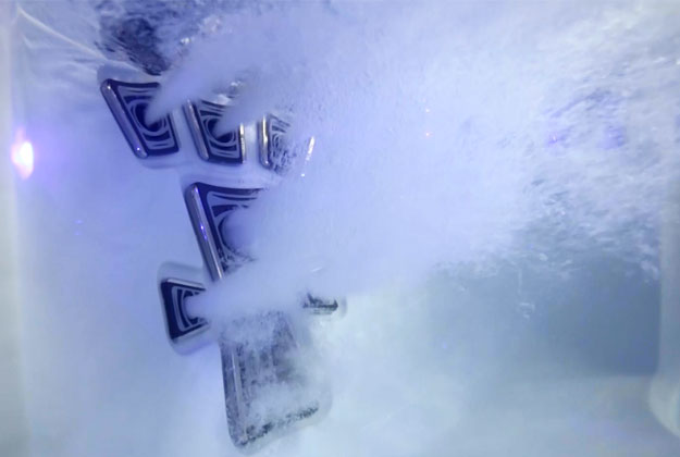 underwater image of jets shooting water